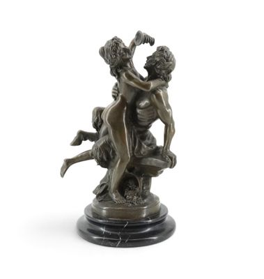 a bronze statue of two men wrestling on a marble base