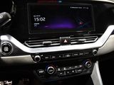 the dashboard of a car with a digital display in the center