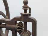 a close up of an old sewing machine on a table