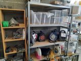 a shelf with many different items on it in a room