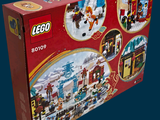 a red box with a picture of a lego city