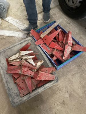 a box full of pieces of wood next to a box of pieces of wood