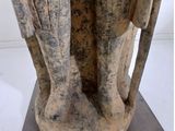 statue of an owl on a pedestal with a white background