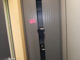 a door in the hallway leading to a closet