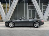 a black sports car parked in front of a building