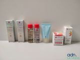 many different types of skin care products lined up on a counter