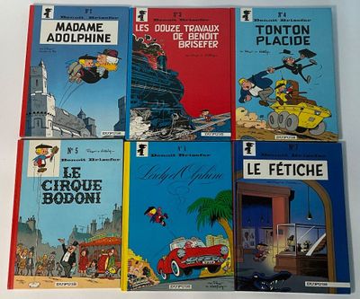 plusieurs livres pour enfants sont alignés sur une surface blanche