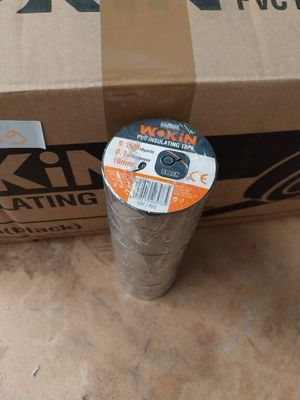 a cardboard box with a roll of duct tape on top of it