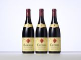 three bottles of wine sitting on top of a table next to each other