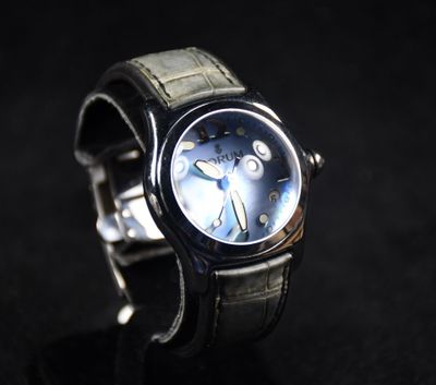 a watch that is sitting on a black surface