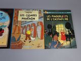 three books that are sitting on a table