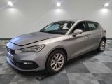 a silver car is parked in a room with a checkered floor