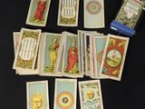 a lot of tarot cards that are on the table