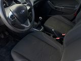 the interior of a car with black leather seats and a steering wheel
