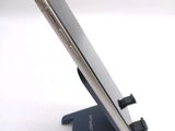 a close up of a cell phone on a stand