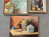 three paintings on a wall of a kitchen with pots and a teapot