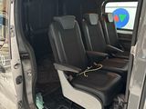 a van that has a seat in the back of it