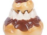 a cake with chocolate and cream on top of it