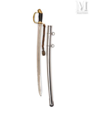 an old sword with a gold handle and a wooden handle