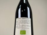 a bottle of wine that is sitting on a table
