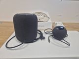 two speakers sitting on a table next to each other