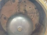 a clock that is sitting on top of a table