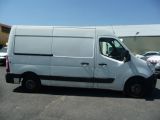 a white van that is parked in a parking lot