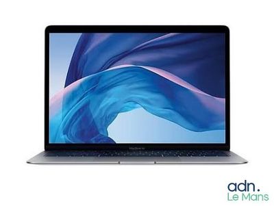 an apple macbook air laptop is shown with a blue background