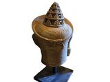 a statue of a man with a hat on it ' s head