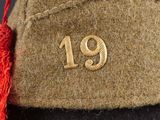 a close up of a hat with the number 19 on it