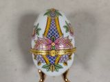 three eggs that are sitting on a table