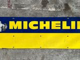 a yellow and blue sign that says michel on it