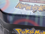 a box of pokemon trading card games sitting on a table