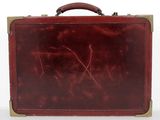 brown leather suitcase with handle on a white surface