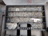 a tool box filled with a bunch of screws and nails