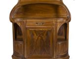 an antique walnut desk with two shelves and a drawer
