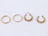 three pairs of gold hoop earrings and a pair of gold hoop earrings