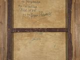 an old picture of a wooden frame with writing on it