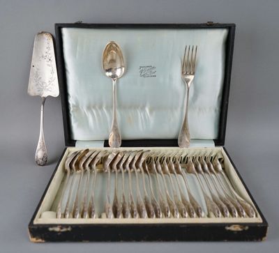 silverware in a case with spoons and forks in it