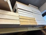 a stack of wooden planks stacked on top of each other