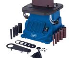 an image of a blue machine with tools and accessories on a white background