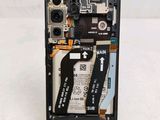a picture of a cell phone with a broken battery