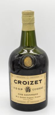 bottle of crozet velop cognac wine on a white background