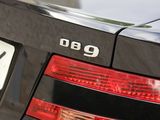 a black car with a number plate on the back of it