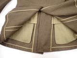 a jacket with a bow on the back of it