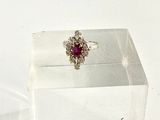a ring that is sitting on top of a clear box