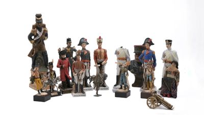 many figurines of different sizes and colors on display