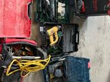 a lot of tools that are sitting on the floor