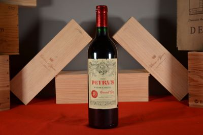 a bottle of wine that is sitting on a table