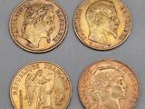 four gold sovereigns, one of which is a sovereign and one of which is a sovereign